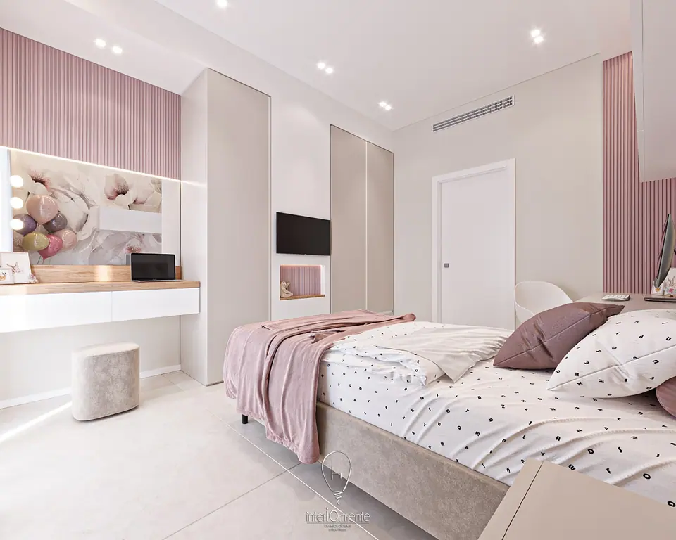 Cameretta con boiserie rosa cannettata, armadio a muro, scrivania bianca e letto con lenzuola a pois