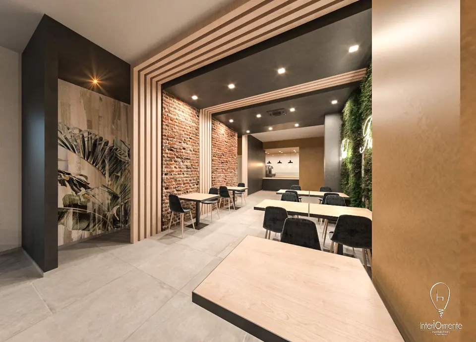 Sala ristorante con mattoni a vista, portale a doghe in legno e tavoli in fila